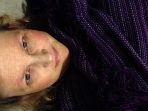 The Artist with her most recent creation: A Woven Purple Shawl